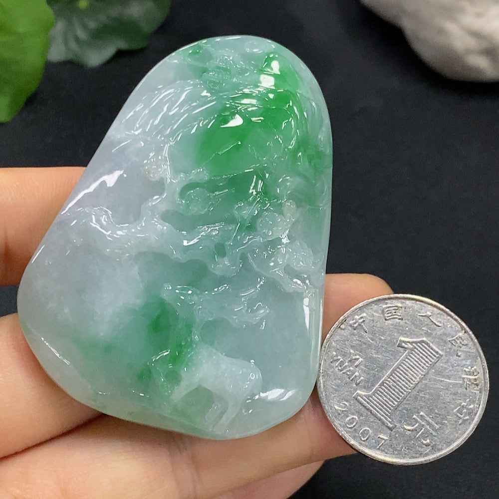 Jadeite deer pendant from HUILIU HQ, detailed jade jewelry with a smooth, polished deer design, weighs 60.587g.