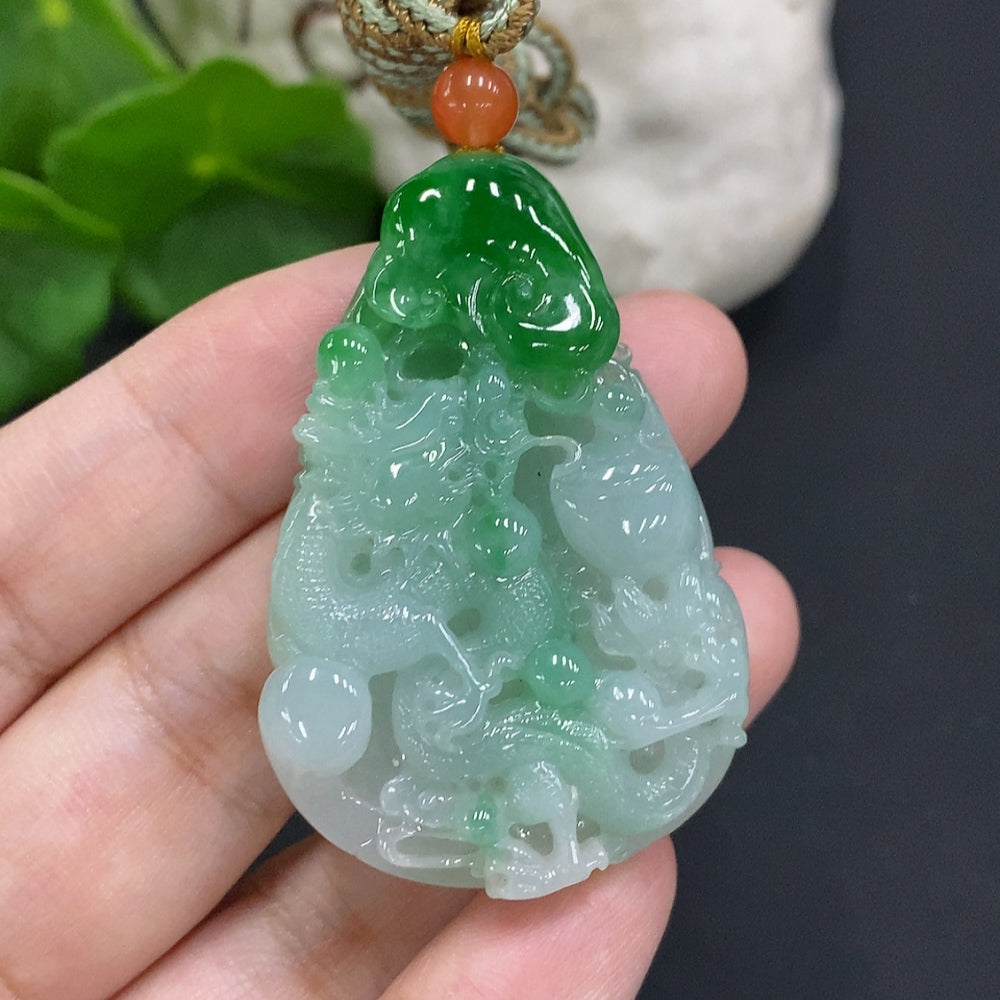 HUILIU HQ jadeite dragon pendant with attached rope, weighing approximately 25.6g, showcasing intricate dragon design and smooth jade surface.