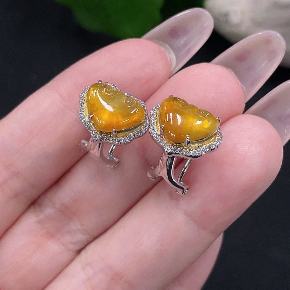 HUILIU HQ jadeite earrings pair with 18K gold and diamond accents, showcasing polished green jade stones and elegant gold settings.