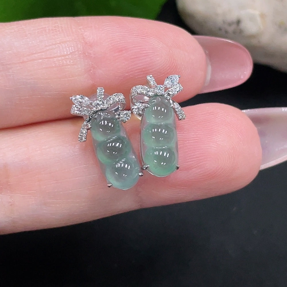 Huiliu Certified Jadeite earrings pair with two large non-diamond jade stones and ear studs, showcasing vibrant green jade jewelry.