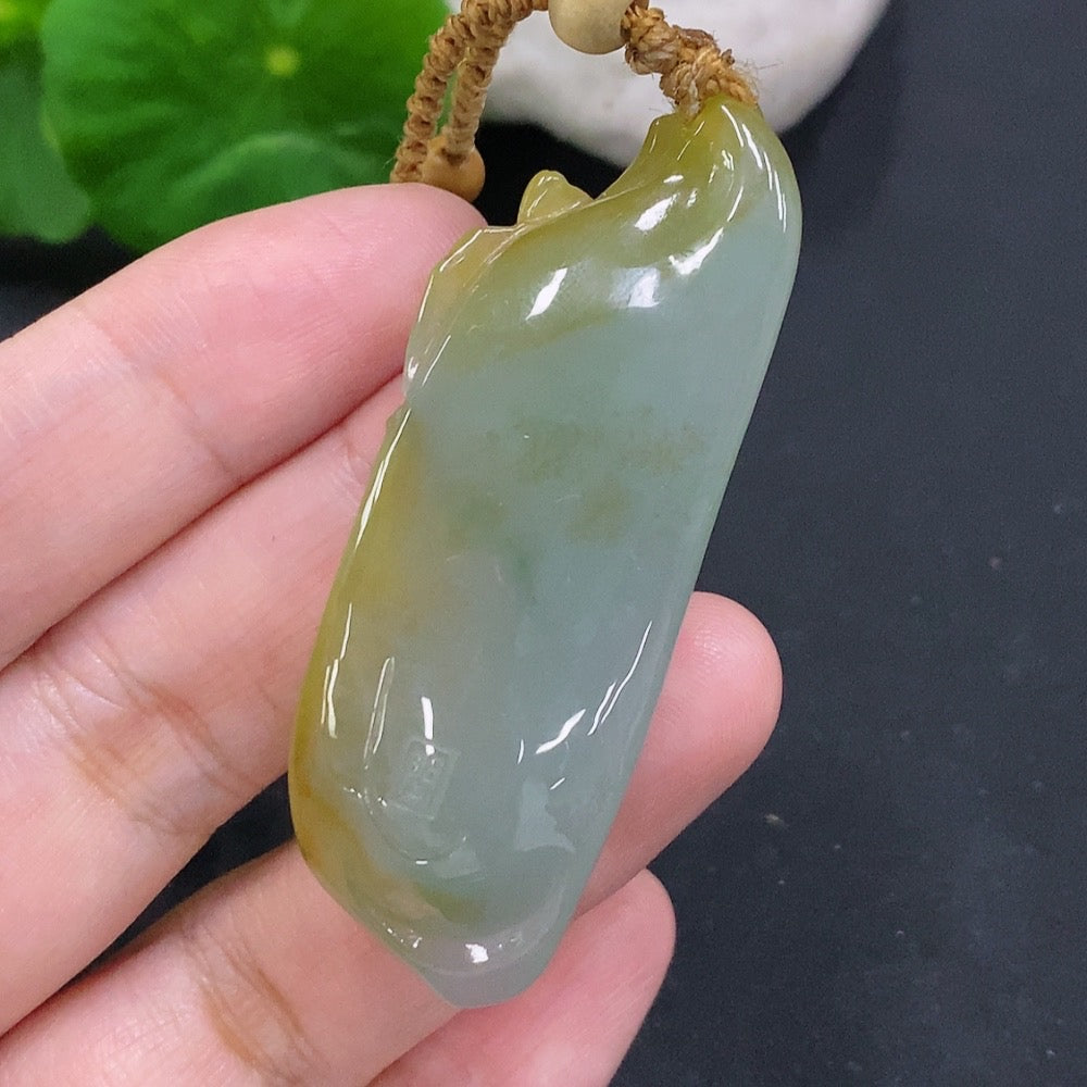HUILIU HQ jadeite Enlightenment Pendant featuring a smooth, polished green jade pendant with intricate carvings.