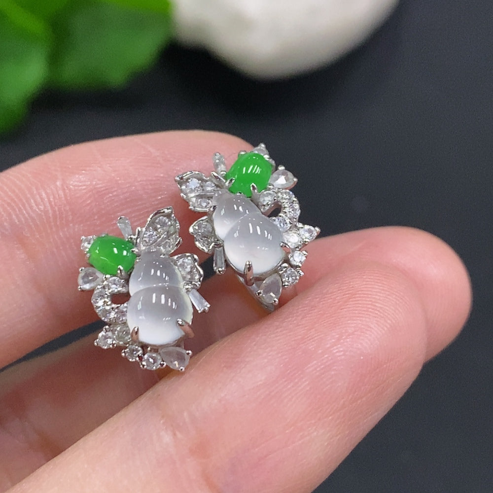 HUILIU HQ jadeite gourd earrings with 18K gold and diamond accents, showcasing intricate inlaid jade in a delicate design.