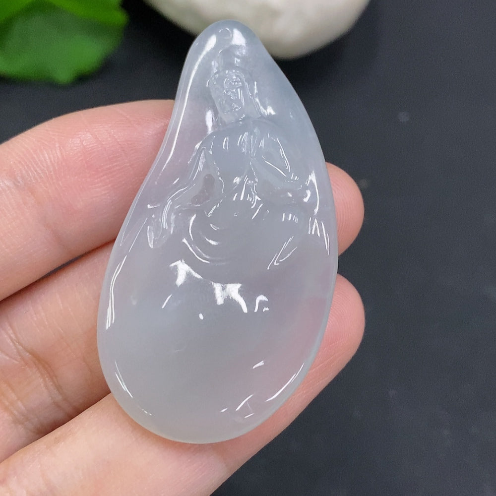 Huiliu certified jadeite Guanyin pendant with intricate carving, featuring a serene Buddhist figure on a smooth jade surface.