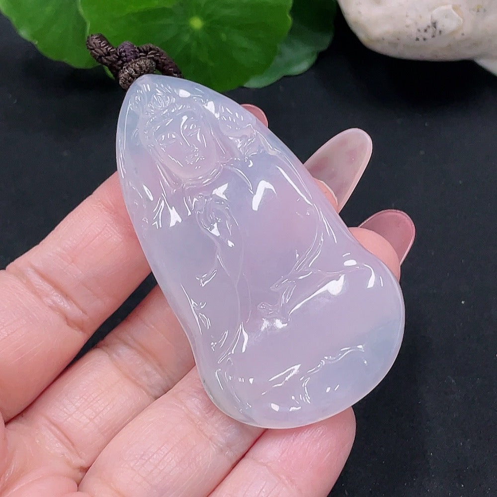 Huiliu HQ Jadeite Guanyin pendant with rope weight, crafted from green jade, certified by Huiliu, displayed on a plain background.