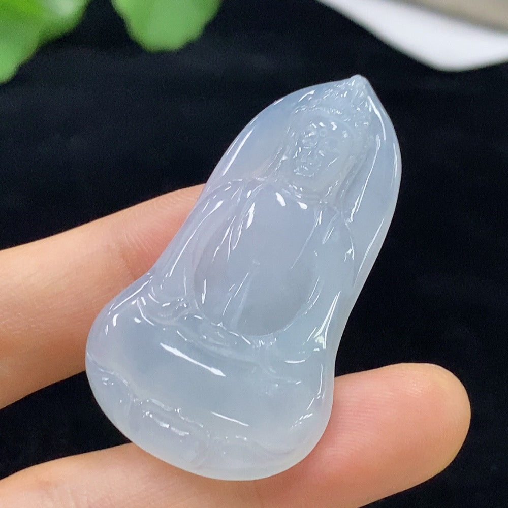 Jadeite Guanyin pendant in green jade, crafted by HUILIU HQ, weighing approximately 11.09g, with detailed carved figure.