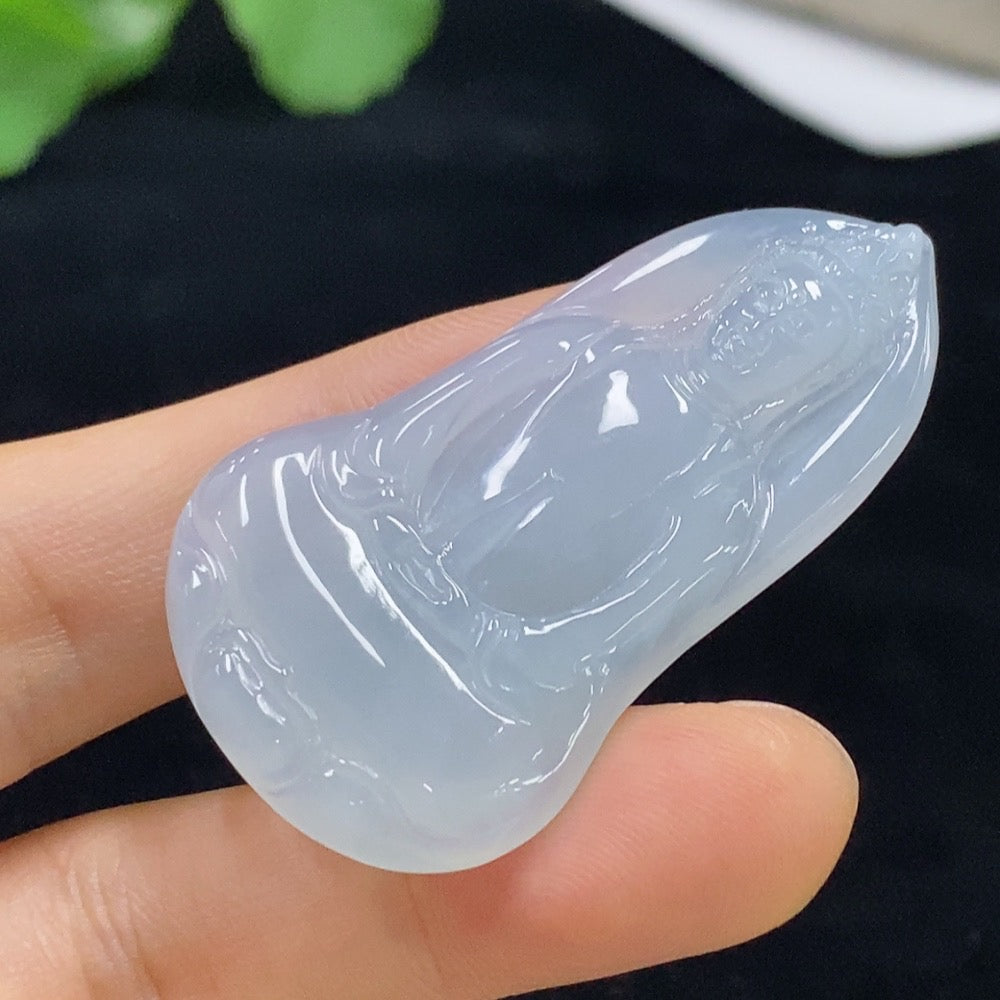 Jadeite Guanyin pendant from HUILIU HQ, intricately carved in jade, weighing approximately 11.09g, featuring detailed religious iconography.