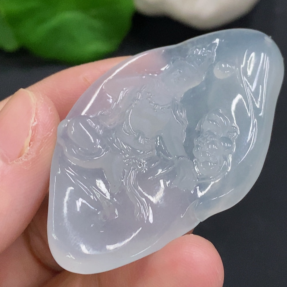 Jadeite Guanyin pendant from HUILIU HQ, detailed green jade carving, weighs approximately 15.9g, featuring intricate design.