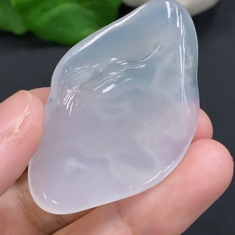 Jadeite Guanyin pendant, crafted from jade, weighing approximately 15.9g, featuring detailed religious figure design.
