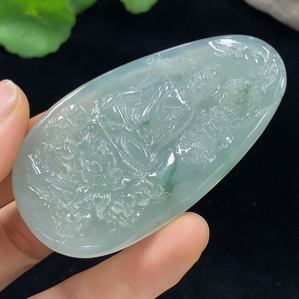 Jadeite Guanyin pendant from HUILIU HQ, carved jade with detailed figure, weight approx. 36.45g, natural green jade color.