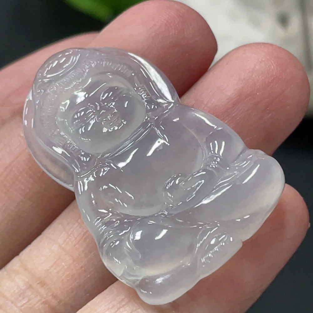 HUILIU HQ jadeite Guanyin pendant, intricately carved, weighing approximately 6.42g, showcasing detailed Buddhist iconography.