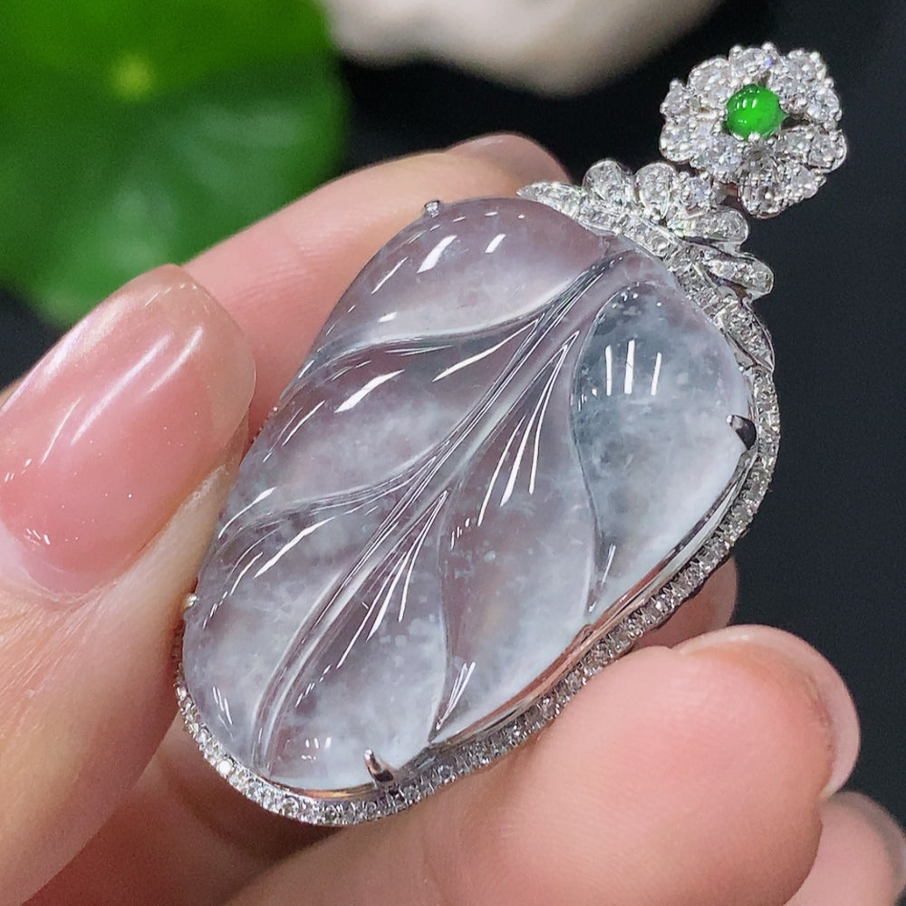 Jadeite leaf pendant with 18k gold and diamonds, HUILIU HQ, featuring intricate inlay and a total weight of about 5.7 grams.