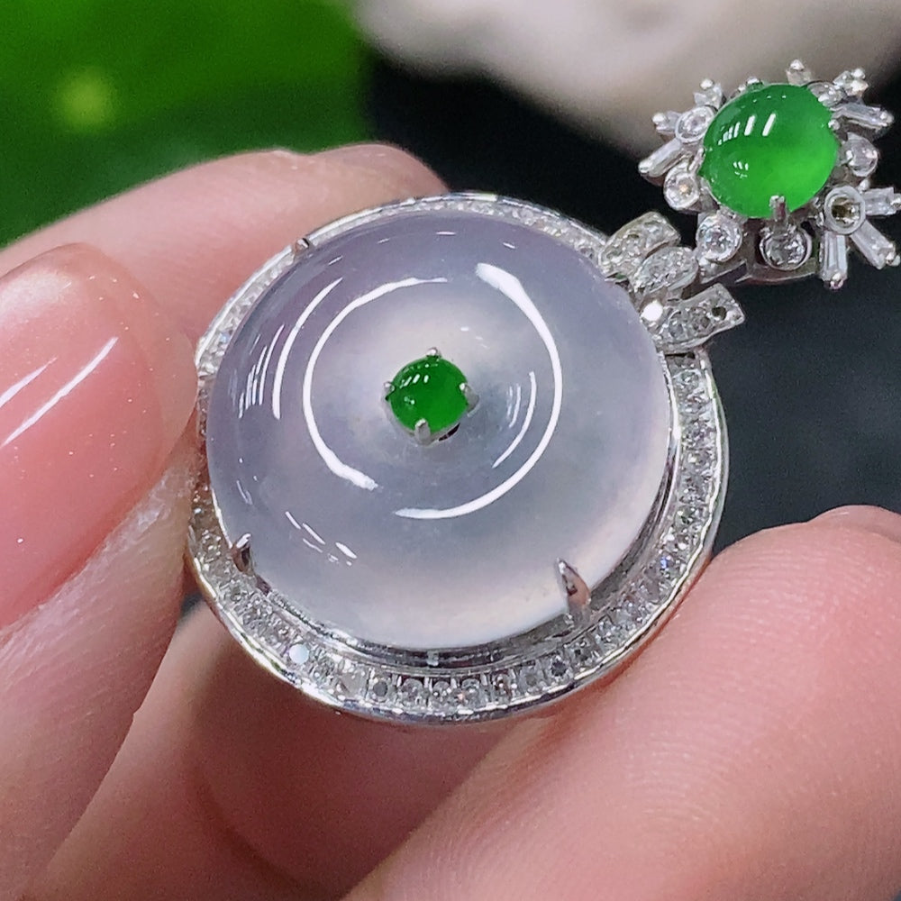 Jadeite inlaid peace pendant by HUILIU HQ with 18K gold accents and diamond details, displayed against a neutral background.