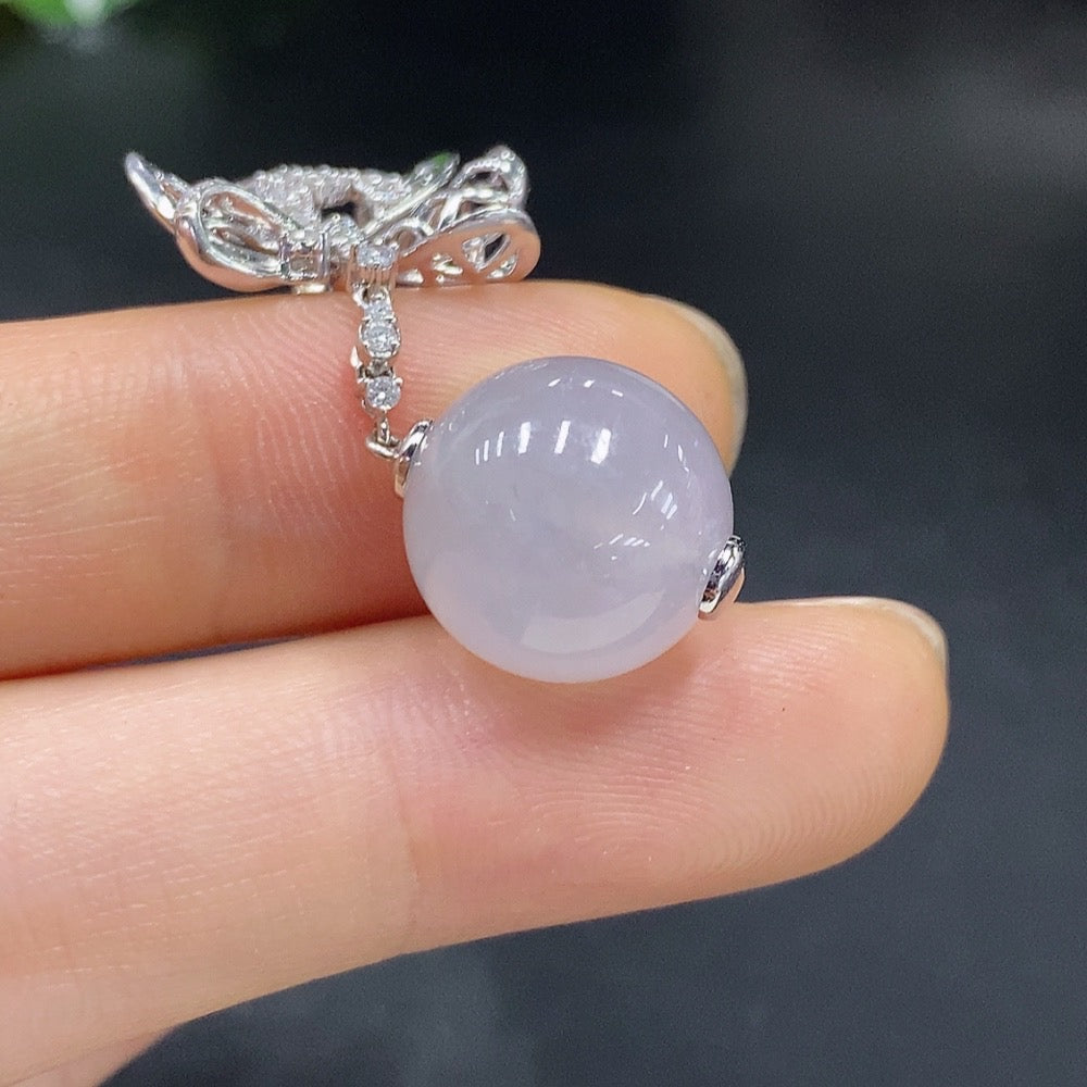 HUILIU HQ 18k jadeite inlaid pendant with intricate design, weighs approximately 6.05 grams, showcasing fine craftsmanship.