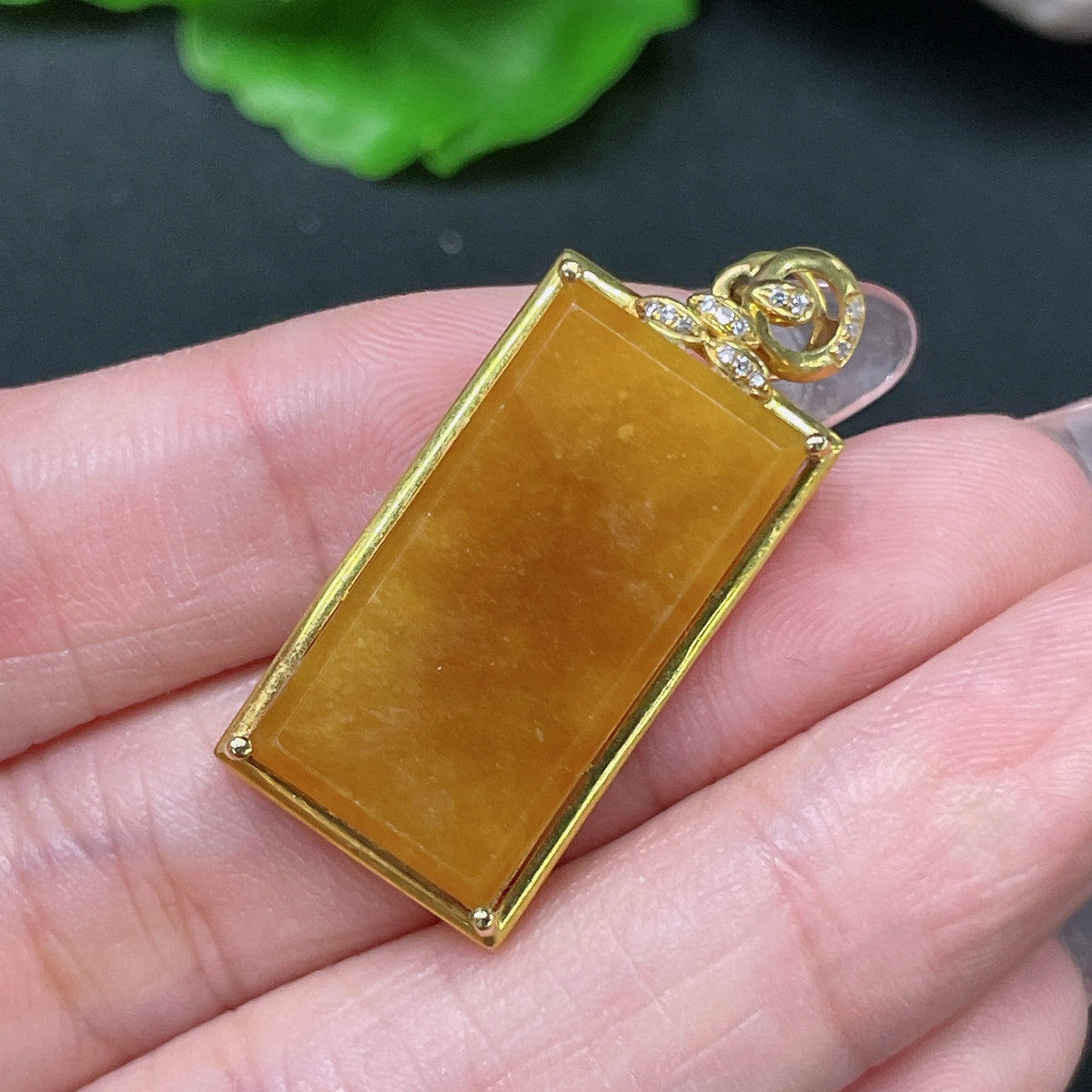Huiliu jadeite inlaid yellow jade piece with undetermined origin, showcasing intricate craftsmanship and vibrant yellow color.