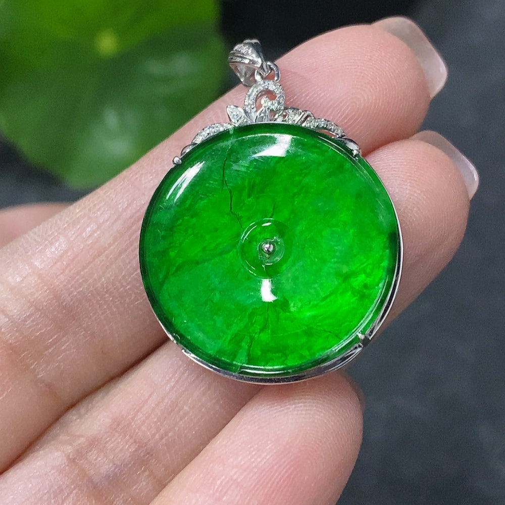 Huiliu Certified Jadeite safety buckle pendant with diamond accents, featuring visible cracks and damage, showcasing intricate inlay work.