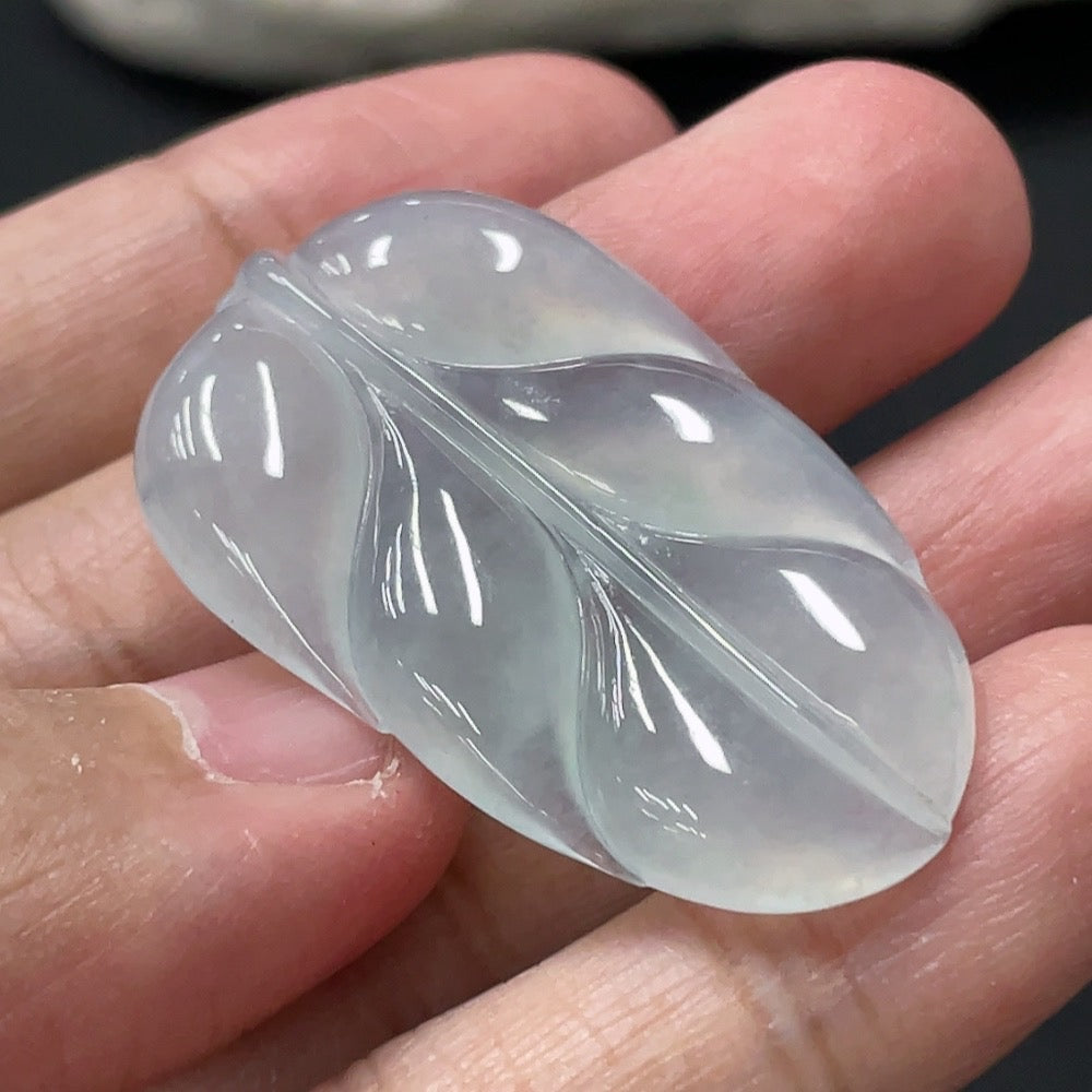 HUILIU HQ jadeite leaf inlay piece, about 6.7g, showcasing detailed jade jadeite design and natural green color.