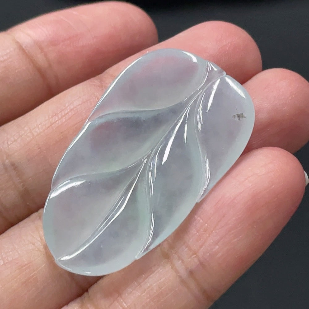 Jadeite leaf inlay piece by HUILIU HQ, approximately 6.7g, showcasing detailed jade leaf craftsmanship and vibrant green color.