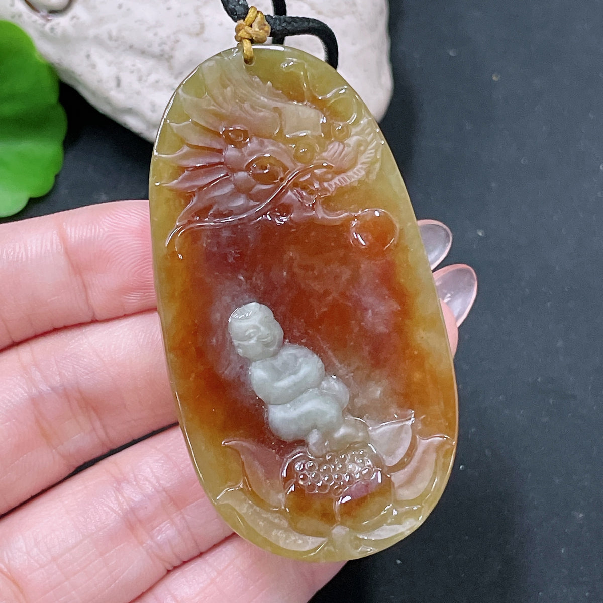 HUILIU HQ jadeite lotus pendant weighing approximately 36.65g with yellow color, featuring a jade necklace and intricate lotus design.