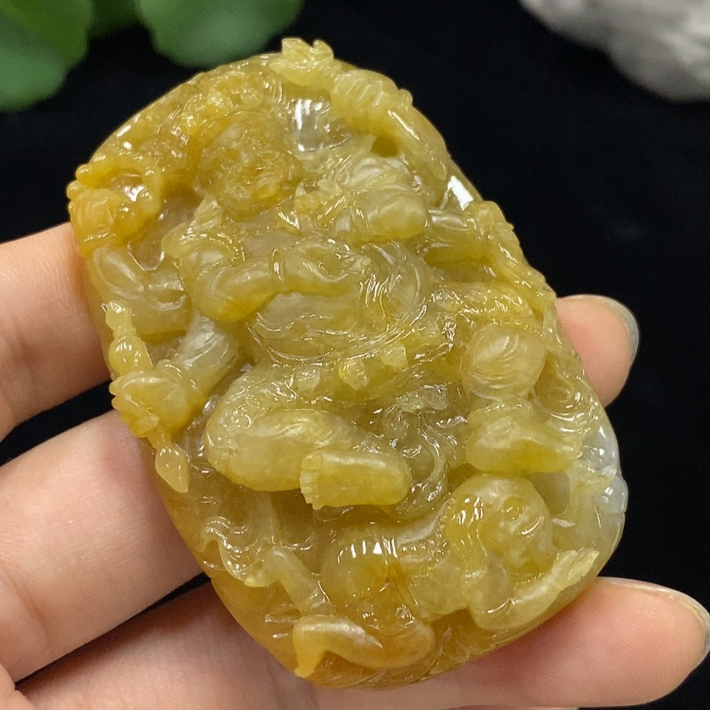 Jadeite Mahakala pendant from HUILIU HQ, carved jade jewelry weighing approx. 66.27g with an undetermined color origin.