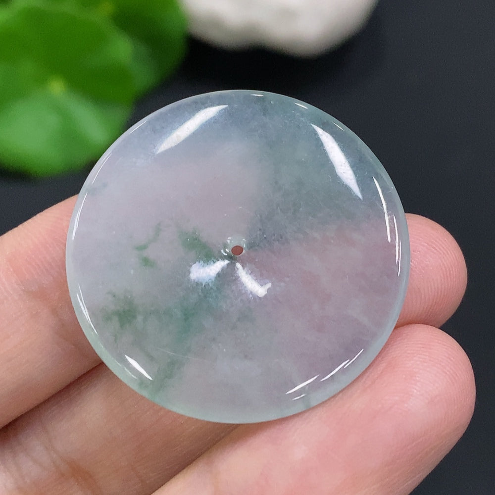 HUILIU HQ jadeite Peace Knot pendant, about 9.2g, featuring intricate craftsmanship and vibrant green jade color.