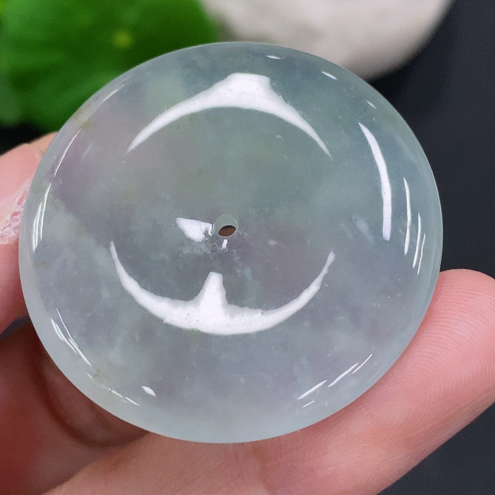 HUILIU HQ jadeite peace knot pendant, approximately 16.4g, showcasing traditional craftsmanship and smooth, polished jade surface.