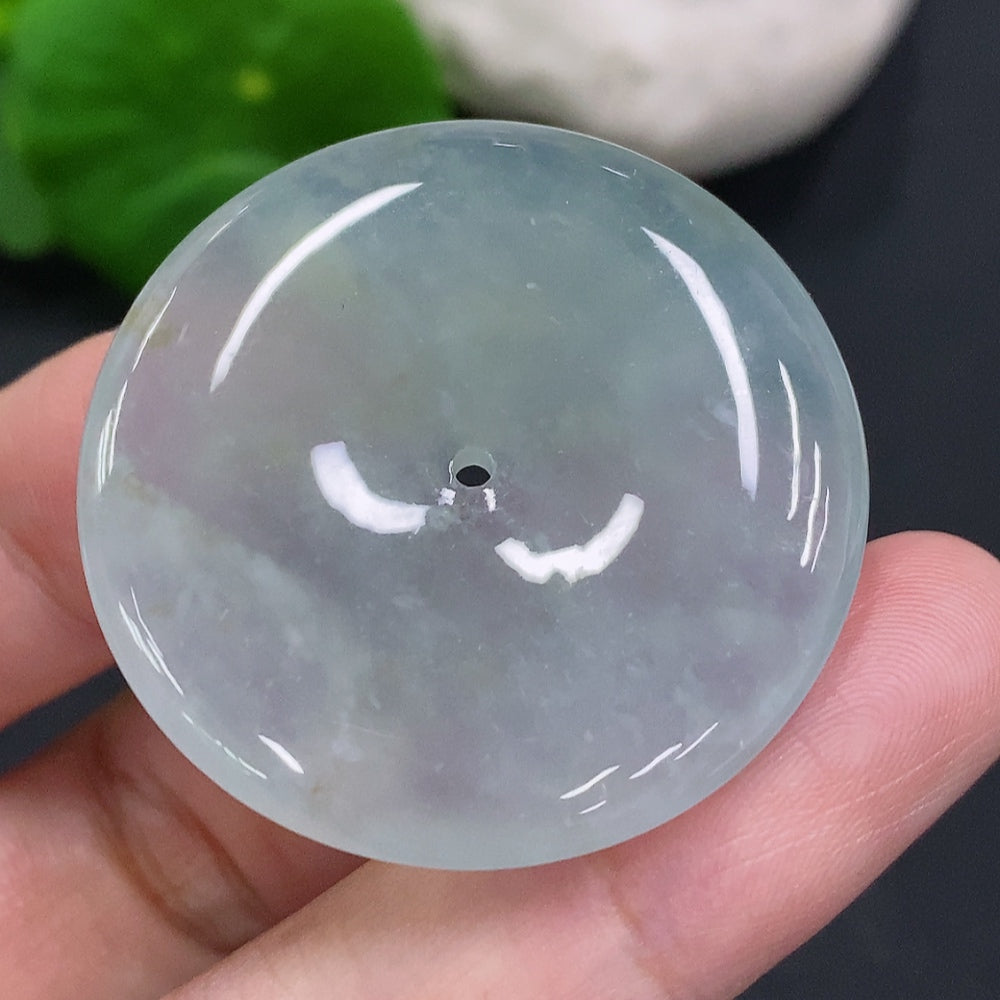 HUILIU HQ jadeite peace knot pendant, approximately 16.4g, featuring intricate craftsmanship and vibrant green jade color.