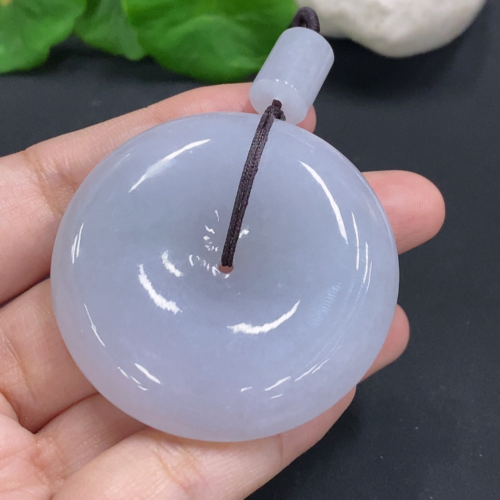 HUILIU HQ Jadeite Peace Knot pendant, approximately 56.5g, showcasing intricate craftsmanship and vibrant green jade material.