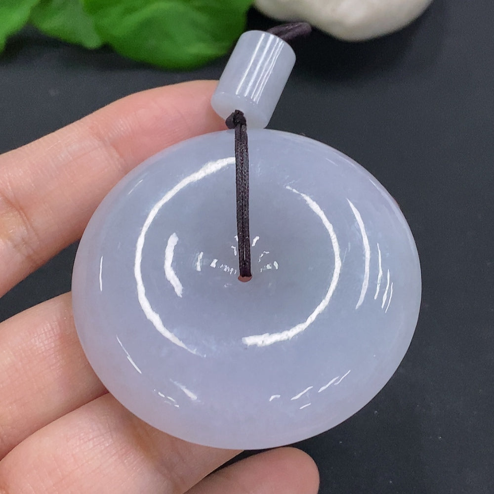 Jadeite Peace Knot pendant in HUILIU HQ jade, approximately 56.5g, showcasing smooth, polished green jade with intricate knot design.