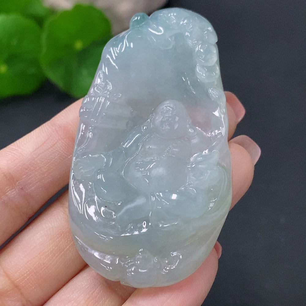 Jadeite Buddha pendant from HUILIU HQ, detailed jade carving featuring a serene Buddha figure on a smooth jade surface.