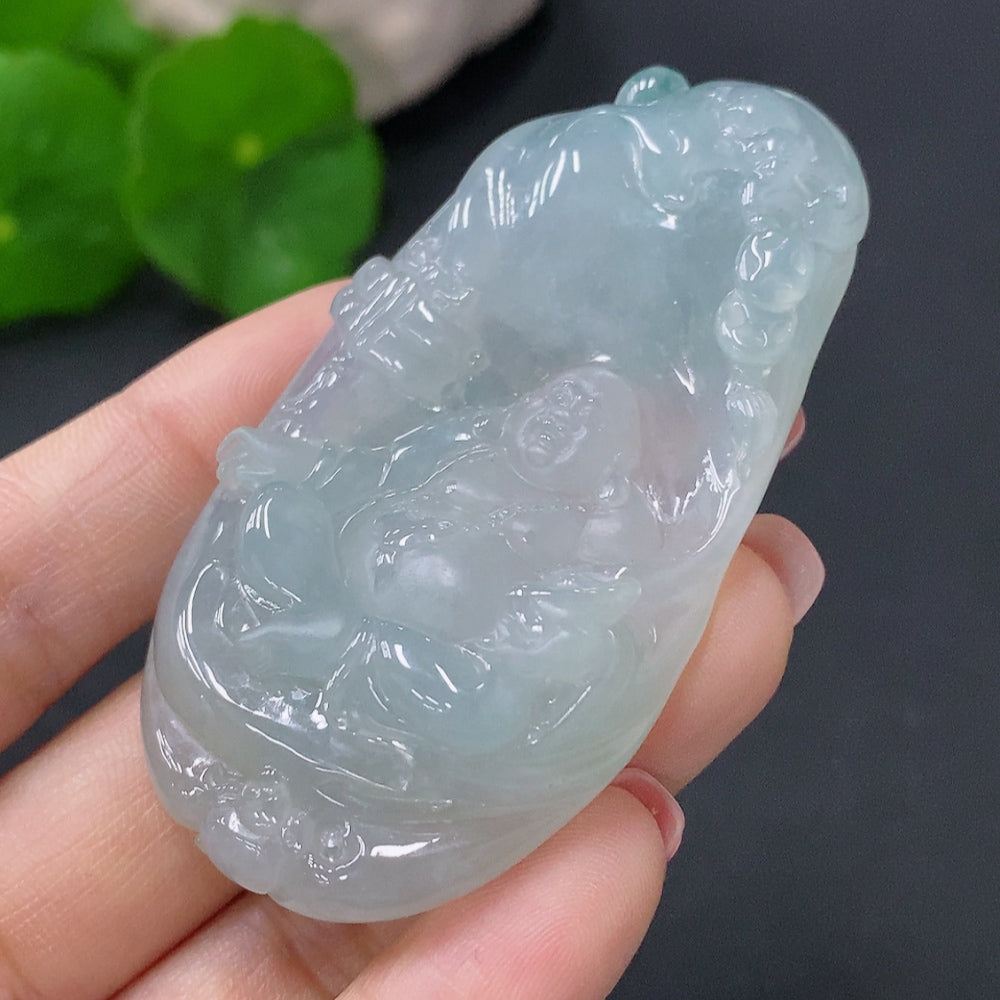 Jadeite Buddha pendant in green jade, featuring a detailed carved Buddha figure, crafted by HUILIU HQ.