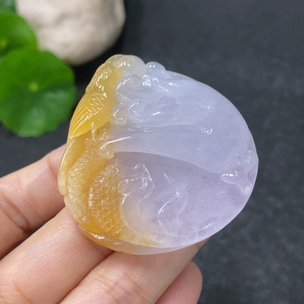 Huiliu certified jadeite pendant with undetermined color origin, showcasing a smooth, polished jade gemstone on a delicate cord.