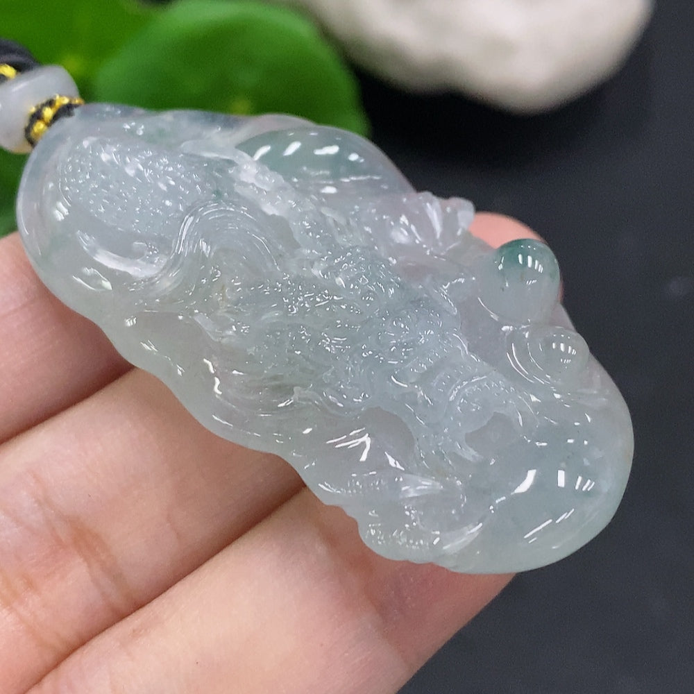 Jadeite pendant dragon plaque with cord, crafted by HUILIU HQ, weighing approximately 27.4g, featuring intricate dragon design.