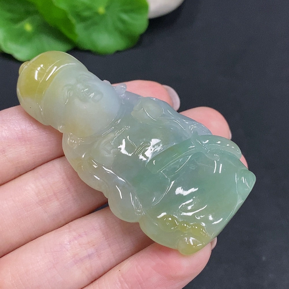Huiliu HQ yellow jadeite pendant with undetermined origin, showcasing a smooth, polished jade stone pendant.