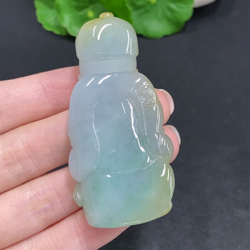Huiliu certified yellow jadeite pendant with undetermined origin, showcasing smooth polished surface and vibrant yellow color.