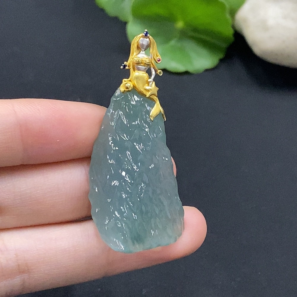 Huiliu Certified Jadeite Pendant featuring smooth green jade with natural variations and polished finish.