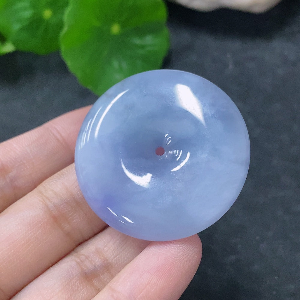 Huiliu HQ jadeite pendant with peace buckle design, crafted from polished green jade, certified by Huiliu for quality.