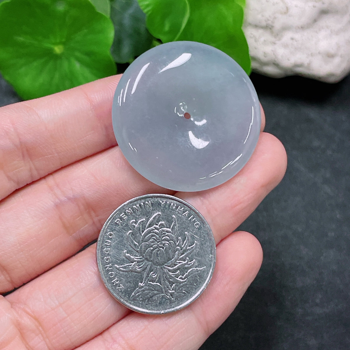 Huiliu Certified Jadeite Pendant featuring a Peace Buckle design, showcasing smooth green jade with intricate carving details.