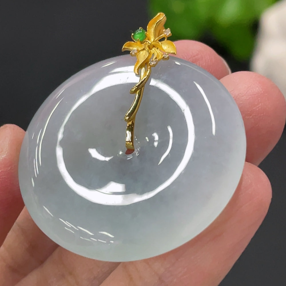 Huiliu Jadeite Pendant with Peace Knot design and diamond accents, showcasing a polished jade piece with intricate craftsmanship.
