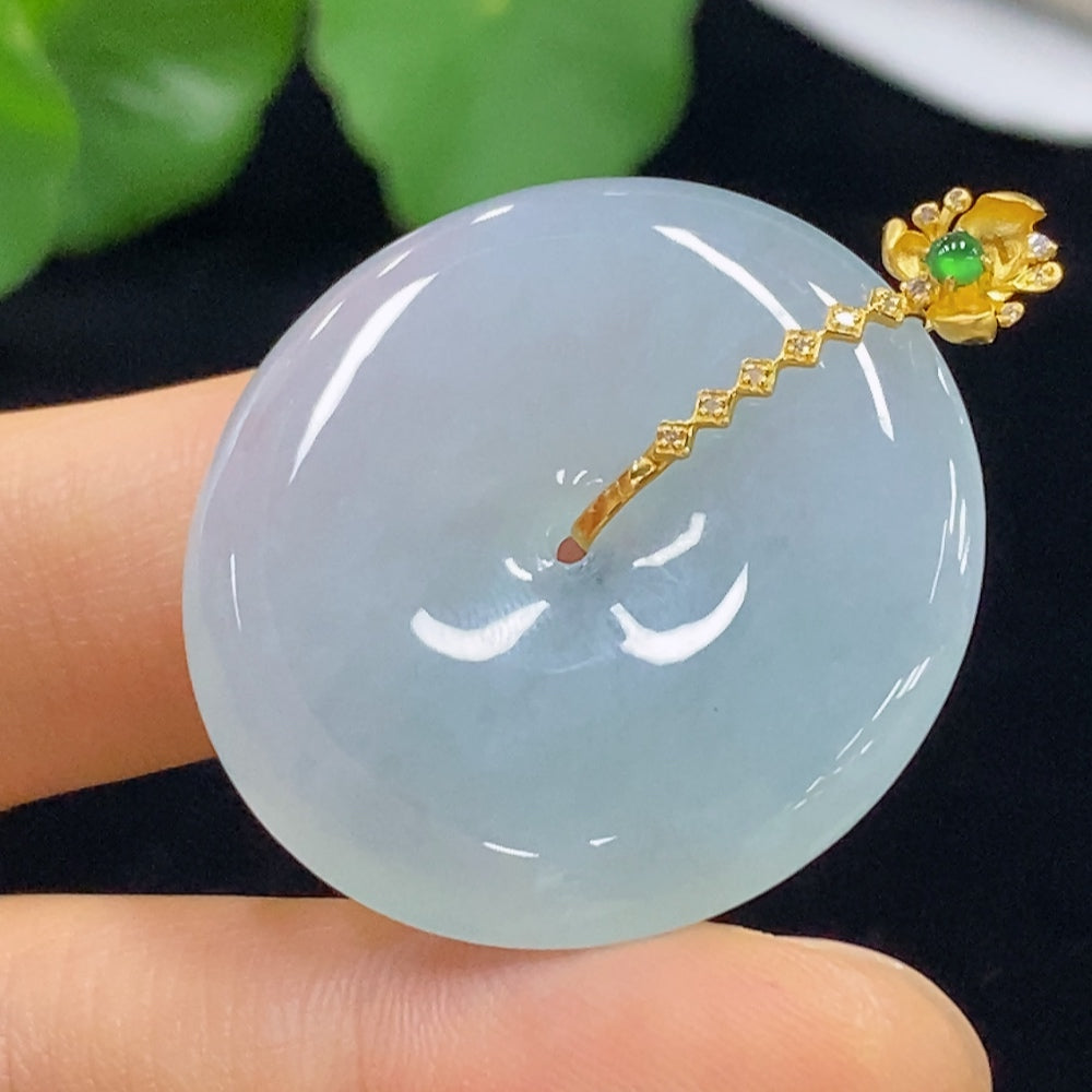 Huiliu Jadeite Peace Knot pendant with inlay and diamond accents, showcasing intricate design and polished gemstone craftsmanship.