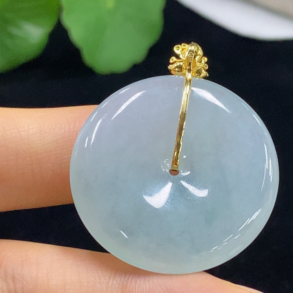 Huiliu HQ jadeite pendant featuring a peace knot design with inlay and diamond accents, showcasing intricate craftsmanship.