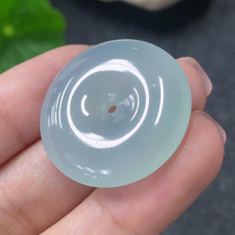 Huiliu HQ jadeite peace ring pendant featuring a smooth, polished jade jadeite stone with carved peace symbol on a silver setting
