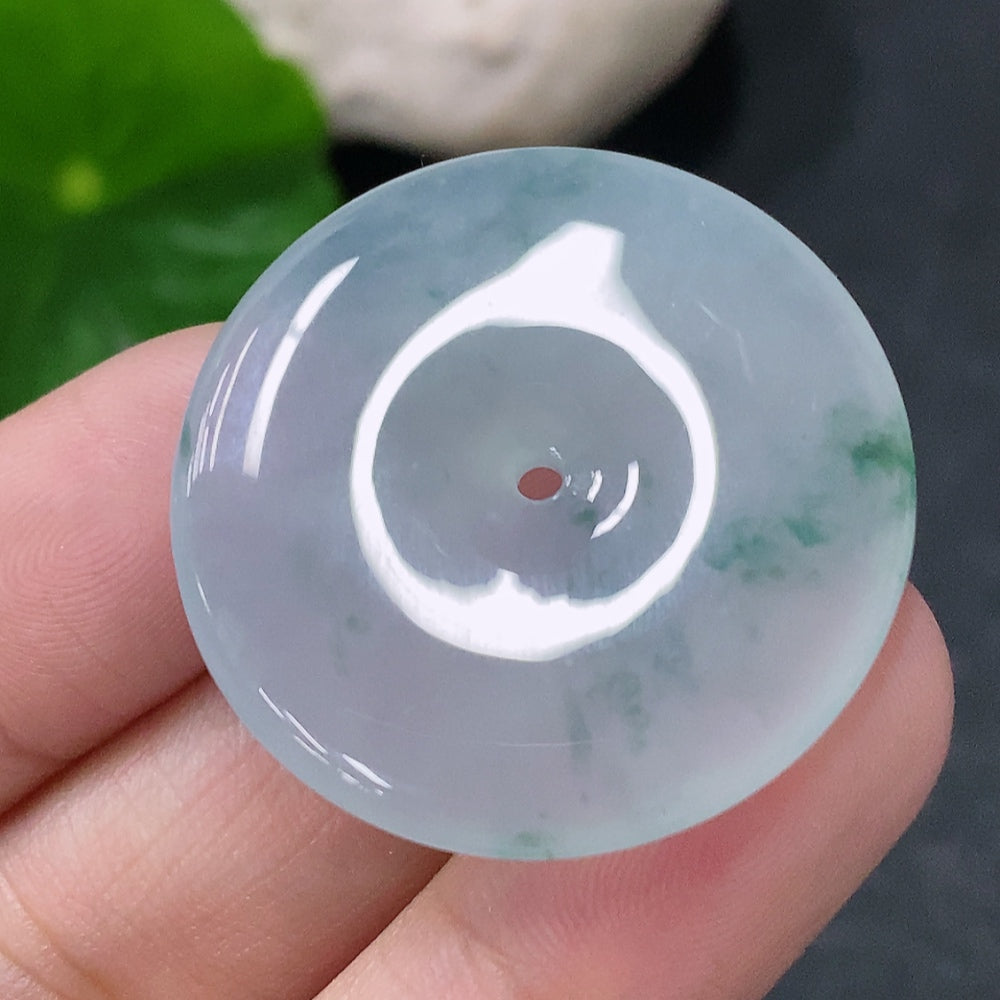 HUILIU HQ jadeite pendant with peace ring design, crafted from jade, weighing approximately 8.64g, shown in a detailed close-up.