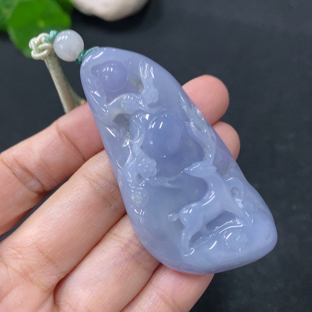 Jadeite pendant shaped like a Sika Deer, crafted by HUILIU HQ, weighing approximately 31.92g, featuring intricate jade craftsmanship.