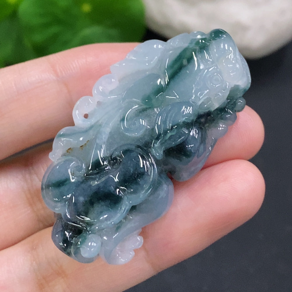 Huiliu certified jadeite Pi Xiu pendant featuring detailed craftsmanship, traditional Chinese symbol, and vibrant green jade color.