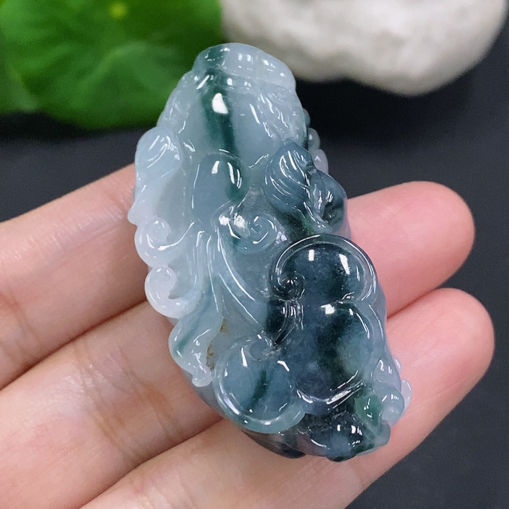 Huiliu certified jadeite Pi Xiu pendant featuring intricate carving and a polished finish, designed for good luck and protection.