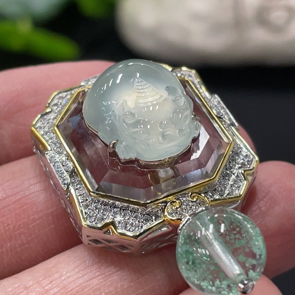 Huiliu Jadeite Pixiu pendant with diamond inlay, featuring accent stones, in a natural setting showcasing detailed craftsmanship.