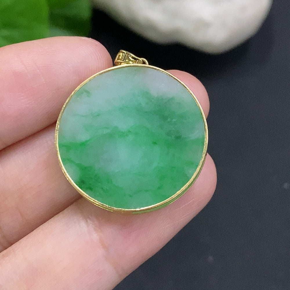 Jadeite plain pendant with 18K gold mounting, weighing approx. 5.2g, showcasing smooth jade stone in a jewelry image.