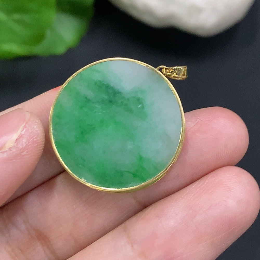 HUILIU HQ jadeite plain pendant with 18K gold mounting, showcasing a smooth, polished jade stone on a delicate gold setting.