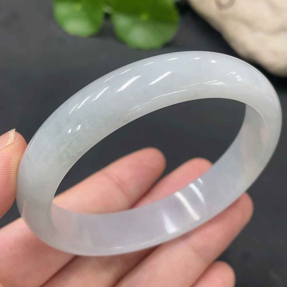 Huiliu HQ jadeite regular bangle, Huiliu certified, showcasing smooth, polished green jade with subtle natural variations.
