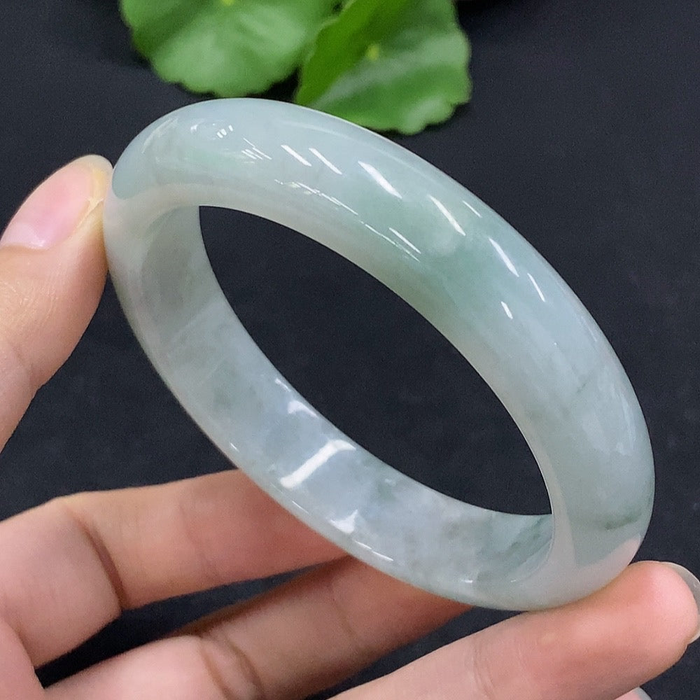HUILIU HQ jadeite regular bangle with 55.8mm inner diameter and 52.13g weight, showcasing smooth, polished jade surface.